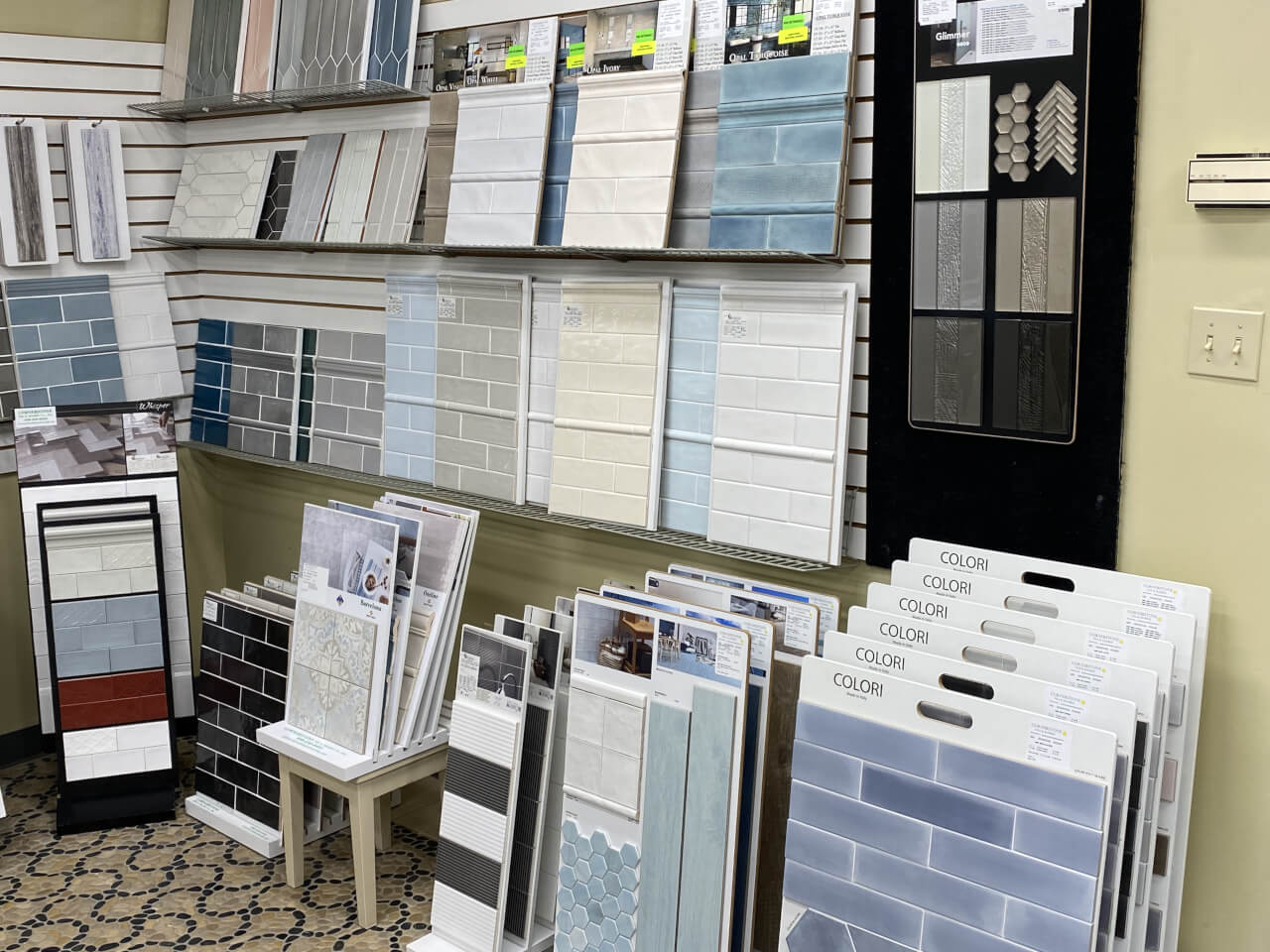 Tile showroom display featuring ceramic and porcelain wall and floor tile collections